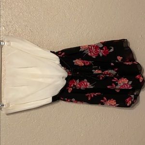 Floral romper. Cream top floral bottom. SizeL